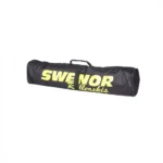 Black cylindrical duffel bag with a yellow logo and a top carrying handle